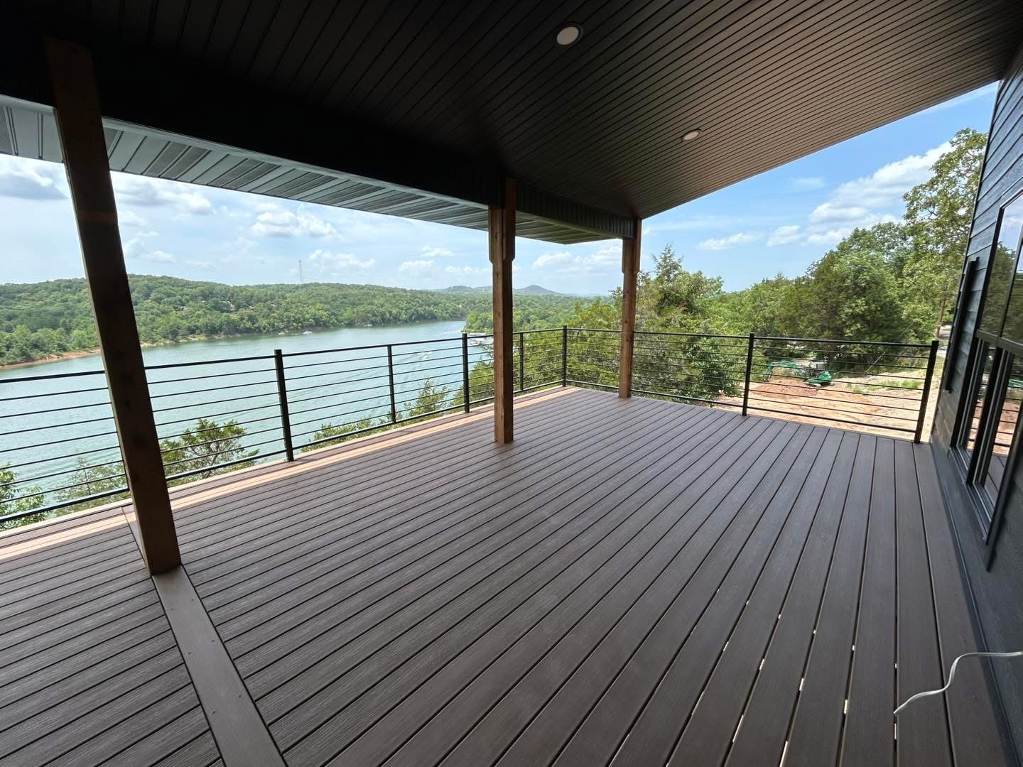 Cedar deck with matte-black steel railing detail